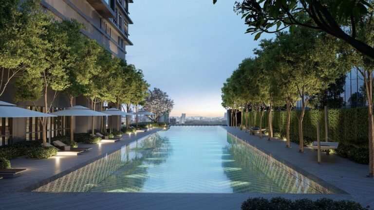 Infinity swimming pool surrounded by landscaped greenery at Khaya Residences Bangsar